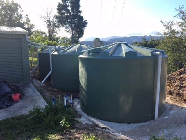 green round poly rainwater tanks